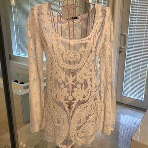 White lace top, long sleeves, new with tags.